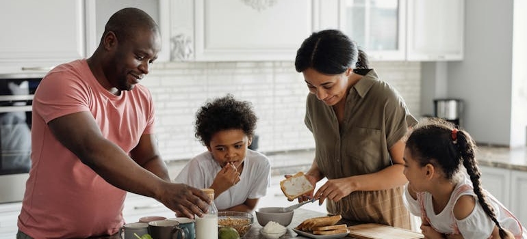Family Making Breakfast in the Kitchen
